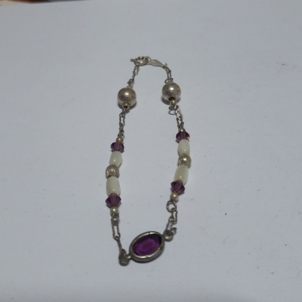 Garnet set in vintage silver bracelet